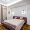 Remarcabil apartament de 2 camere intr-o cladire simbol a Bucurestiului thumb 11