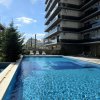 Apartament modern cu balcon generos și acces la piscină thumb 1