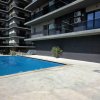 Apartament modern cu balcon generos și acces la piscină thumb 9